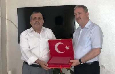 M&uuml;ze M&uuml;d&uuml;r&uuml; Alper&rsquo;in ailesine ziyaret