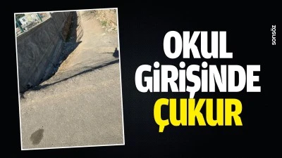Okul girişinde &ccedil;ukur