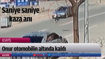 Onur otomobilin altında kaldı