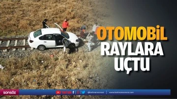 Otomobil raylara u&ccedil;tu