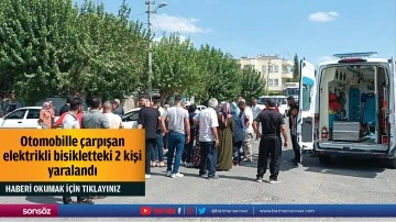 Otomobille &ccedil;arpışan elektrikli bisikletteki 2 kişi yaralandı