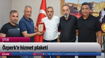 &Ouml;zperk&rsquo;e hizmet plaketi