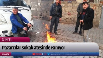 Pazarcılar sokak ateşinde ısınıyor