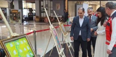 Şehit yakınları ve gazilerin ebru eserleri sergilendi