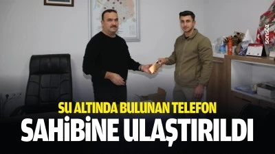 Su altında bulunan telefon, sahibine ulaştırıldı
