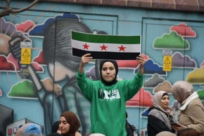 Suriyeliler, Baas rejiminin &ccedil;&ouml;kmesini kutladı