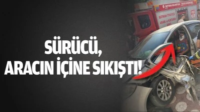 S&uuml;r&uuml;c&uuml;, aracın i&ccedil;ine sıkıştı!