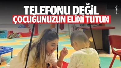 Telefonu değil, &ccedil;ocuğunuzun elini tutun