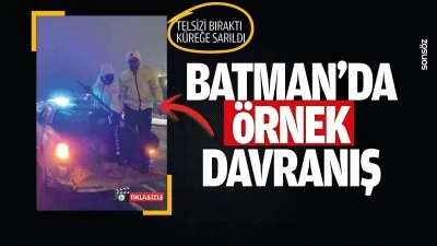 Telsizi bıraktı, k&uuml;reğe sarıldı; Batman&rsquo;da &ouml;rnek davranış