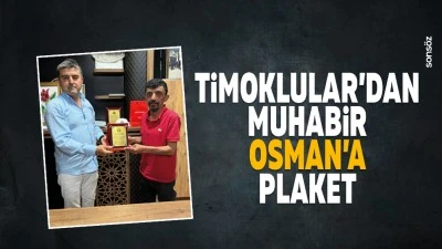 Timoklular&rsquo;dan muhabir Osman&rsquo;a plaket