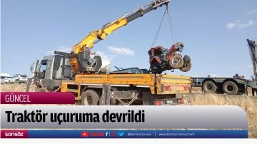 Trakt&ouml;r u&ccedil;uruma devrildi