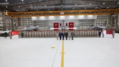 T&uuml;rkiye-Katar İlişkileri G&uuml;&ccedil;leniyor: Bakan G&uuml;ler Katar'da Mehmet&ccedil;ikle Bir Araya Geldi