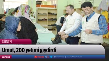 Umut, 200 yetimi giydirdi