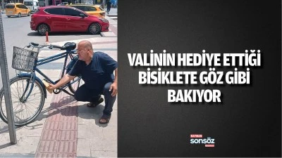 Valinin hediye ettiği bisiklete g&ouml;z gibi bakıyor