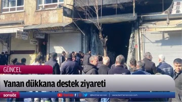 Yanan d&uuml;kkana destek ziyareti