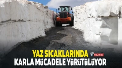 Yaz sıcaklarında karla m&uuml;cadele y&uuml;r&uuml;t&uuml;l&uuml;yor