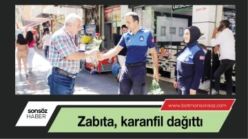 Zabıta, karanfil dağıttı
