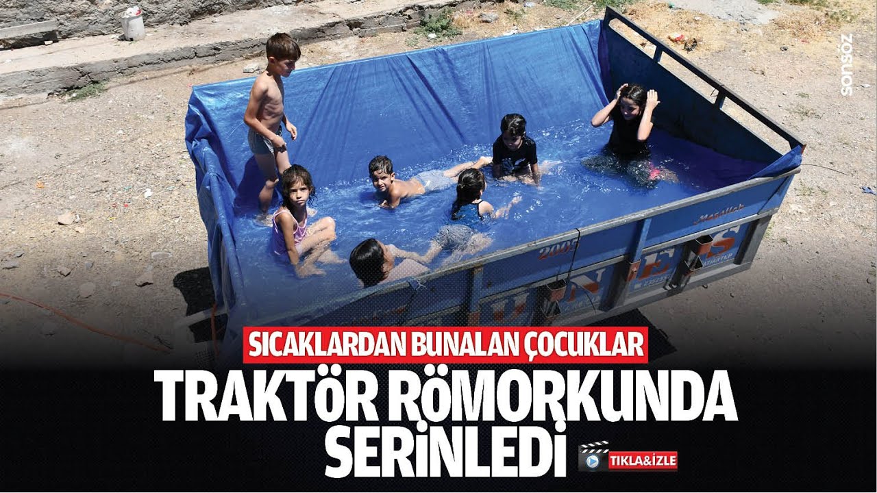 Sıcaklardan bunalan &ccedil;ocuklar trakt&ouml;r r&ouml;morkunda serinledi